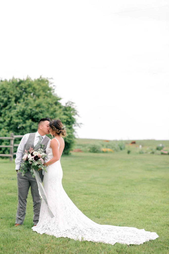 couples photos surrounded by gardens, lush fields, cows and dogs! Nothing better than a prairie farm wedding! https://www.thegathered.ca