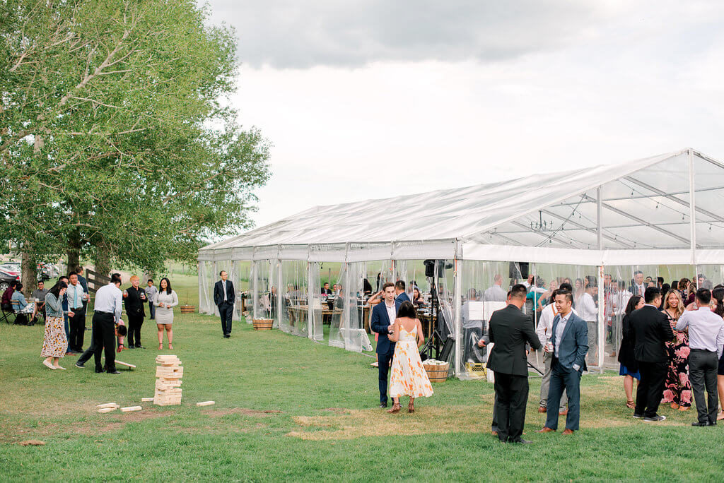 relaxed cocktail hour complete with lawn games and delicious snacks for wedding guests to enjoy while they mingle. https://www.thegathered.ca